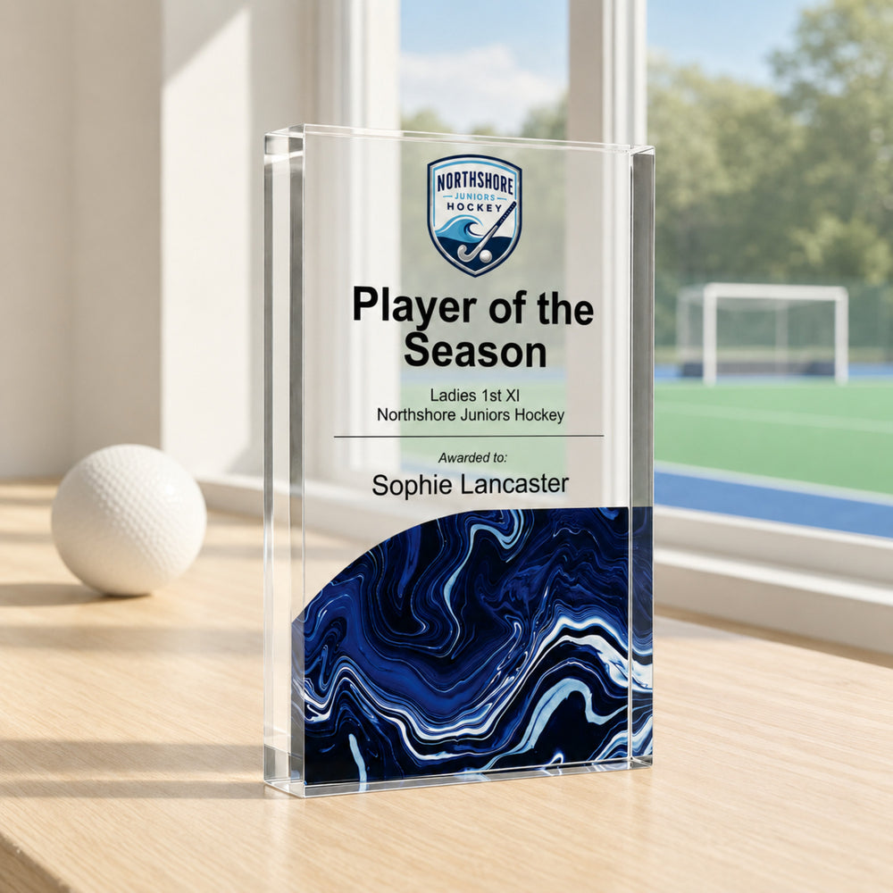 Slim upright personalised hockey trophy printed Player of the Season with a club crest and navy base