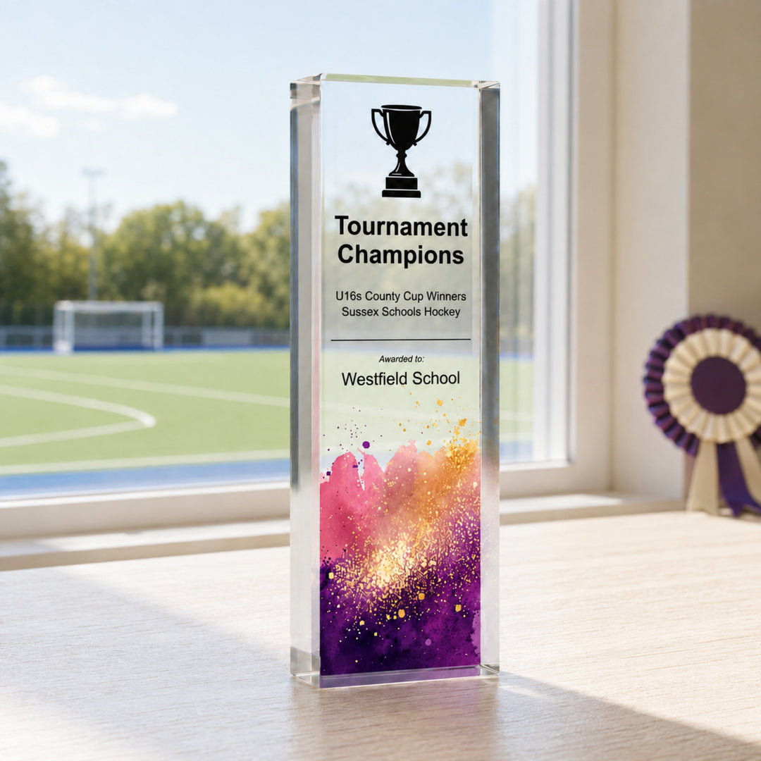 Slim upright personalised hockey trophy printed Tournament Champions for a school hockey team