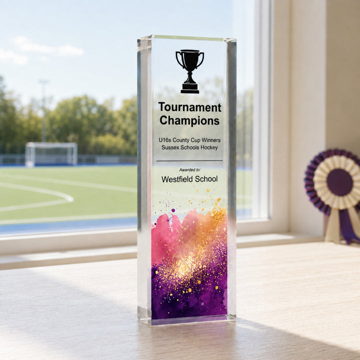 Slim upright personalised hockey trophy printed Tournament Champions for a school hockey team