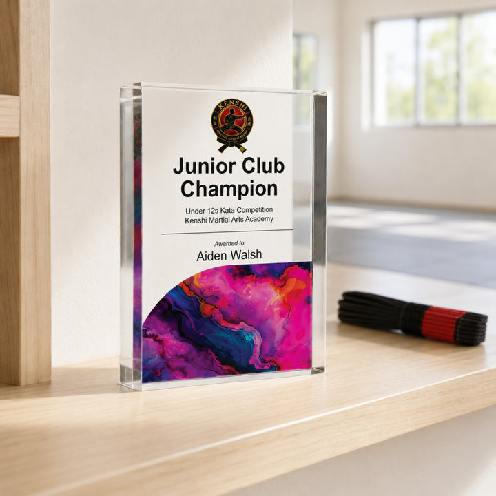 Personalised junior martial arts trophy printed Junior Club Champion with an academy crest