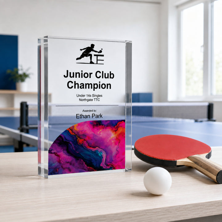 Personalised junior table tennis trophy printed Junior Club Champion beside a bat and ball