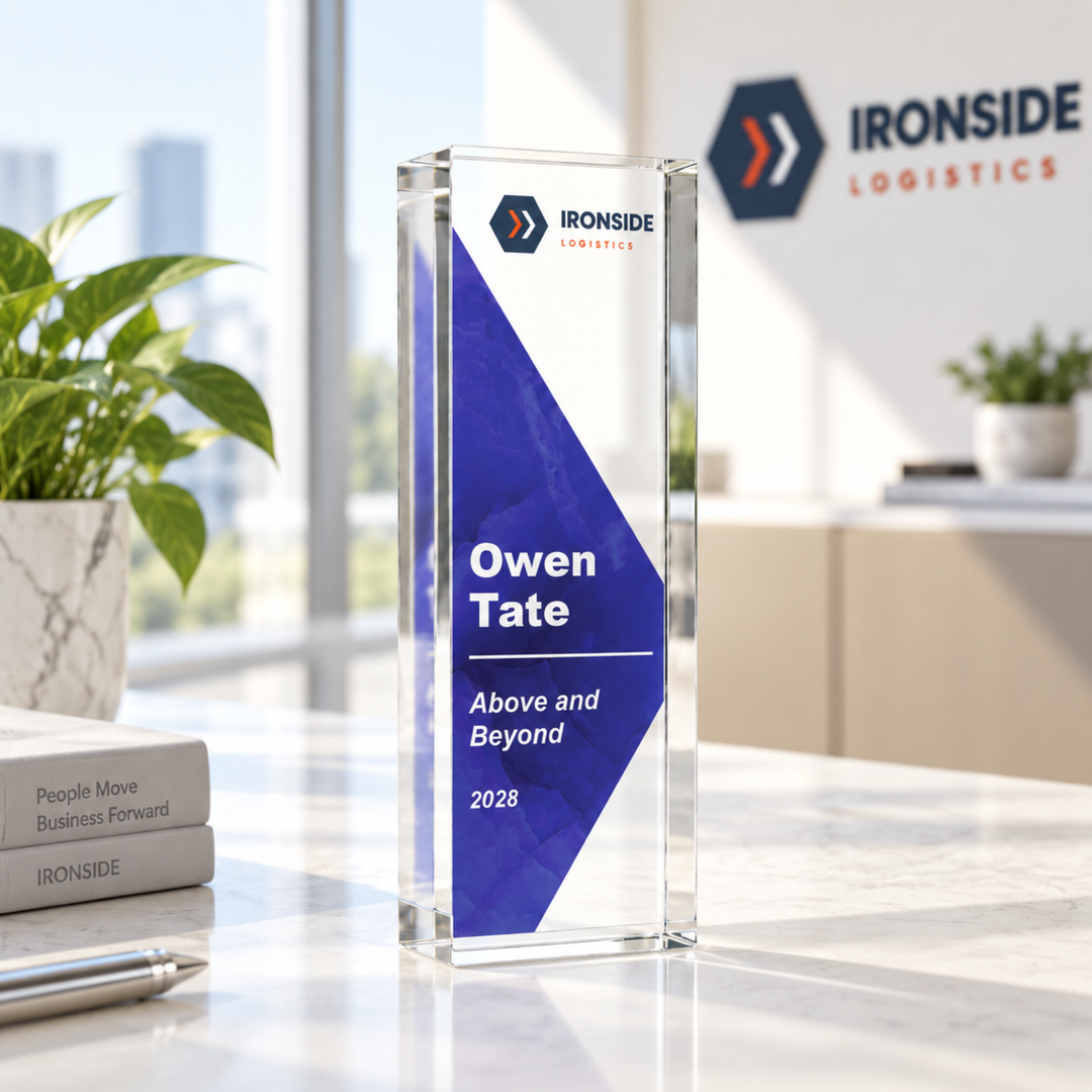 Slim royal blue Above and Beyond staff award in clear acrylic, personalised with the employee's name and logo