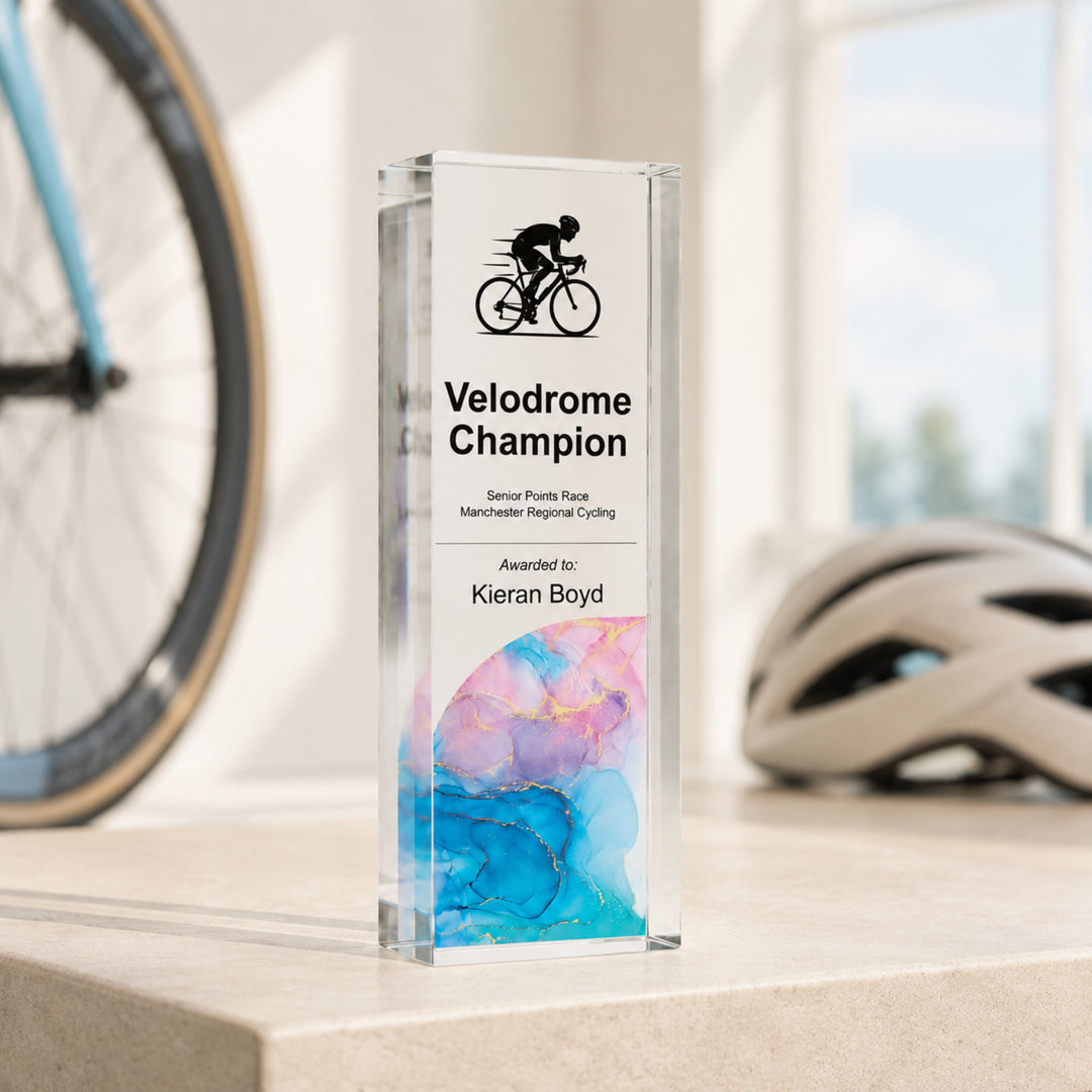 Slim upright personalised cycling trophy printed Velodrome Champion with a blue base
