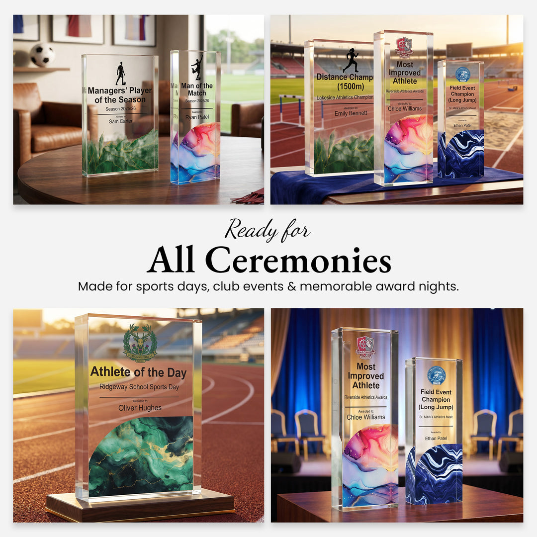 Personalised acrylic sports trophies in several sizes set out for a club presentation evening