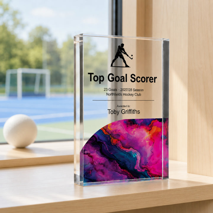 Personalised hockey trophy printed Top Goal Scorer with a player icon and magenta base