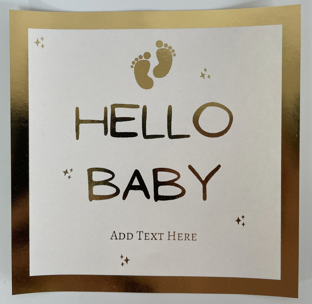 gold foil sticker for a newborn baby gift bag "Hello baby"