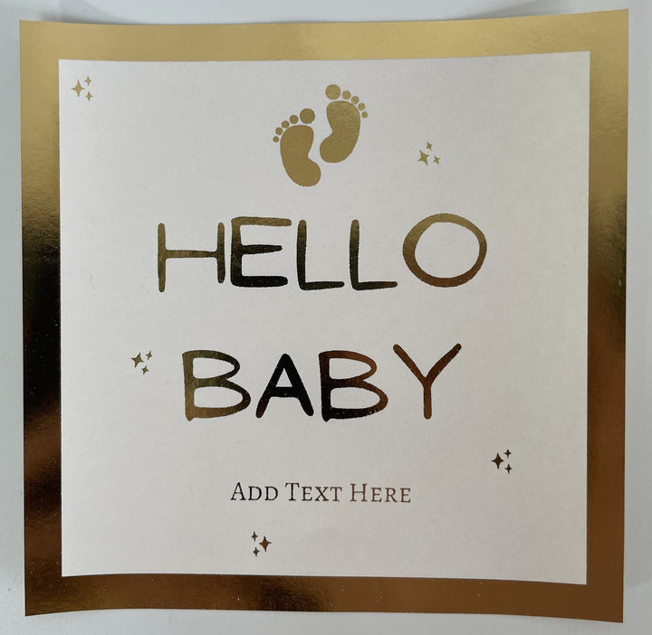 gold foil sticker for a newborn baby gift bag "Hello baby"