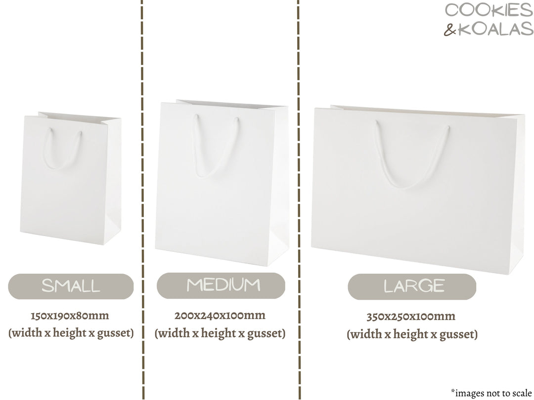 Luxury Personalised Bride Squad White Gift Bag and white sticker with gold foil writing and sticker. The Sticker writing says Bride Squad. Perfect for hen party favours and hen party gift bags for your bride tribe on your hen do and bridesmaid gifts.