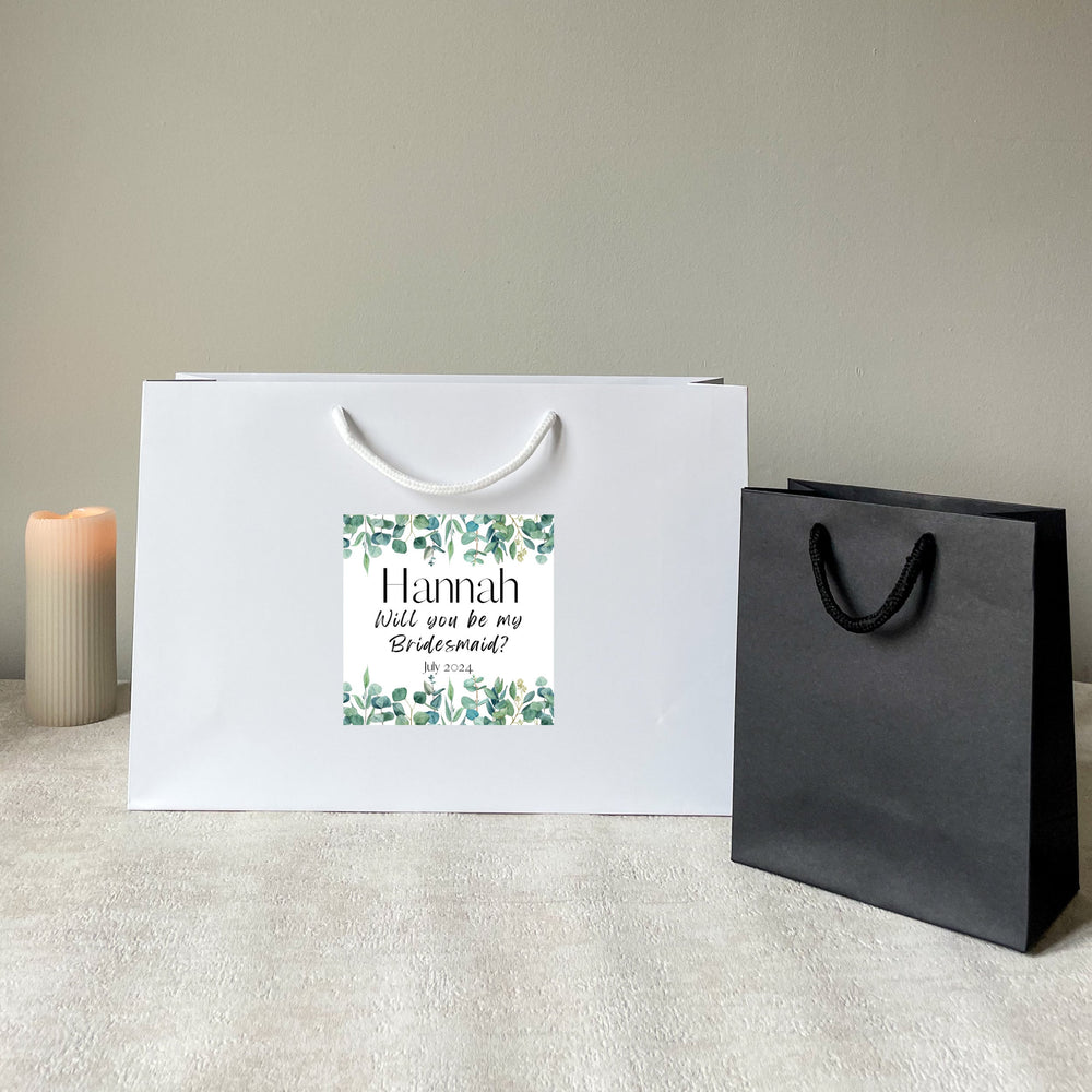 white large wedding favor bags
and small black hen party gift bags