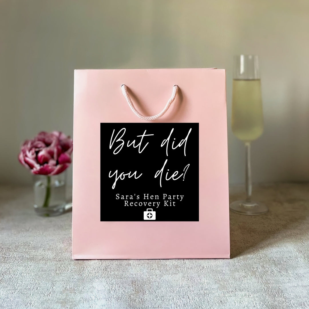 A oink colour hen party gift bags with the custom sticker 
