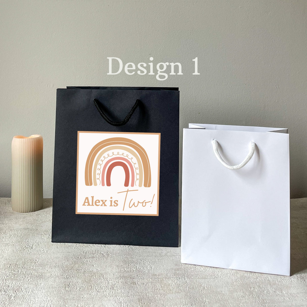 two rainbow party bags black and white with foil stickers