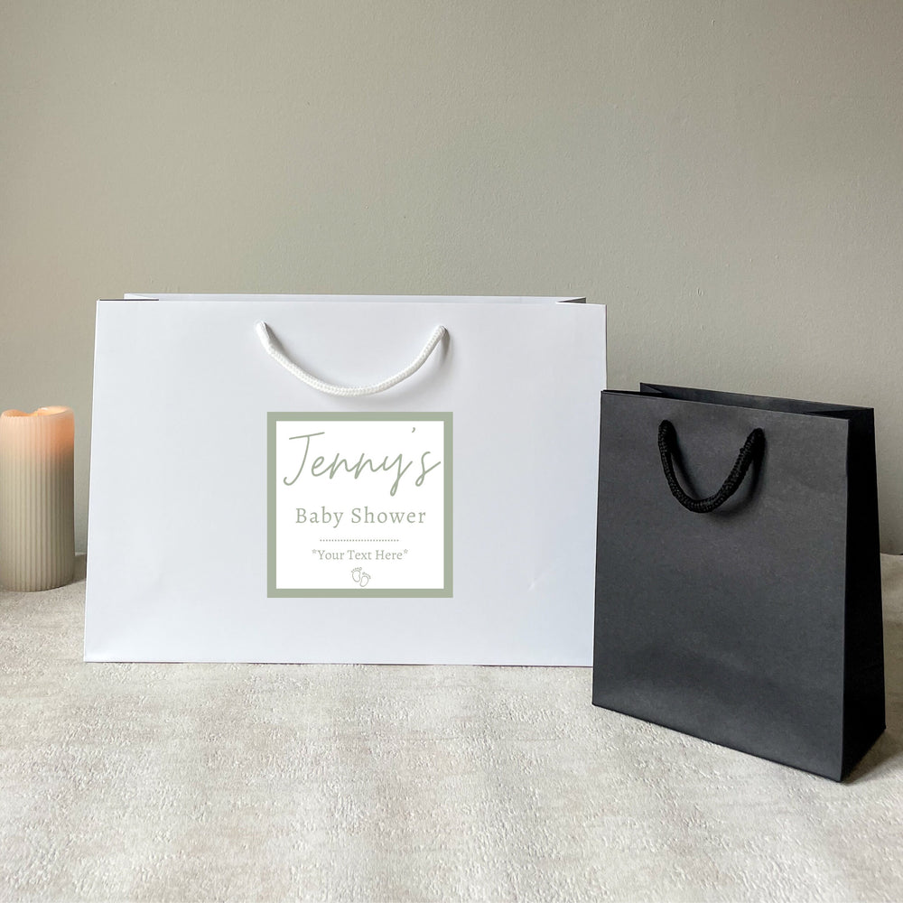 large silver babay shower gift bag and medium gift bag 