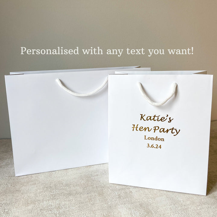 White medium and large baby shower gift bags