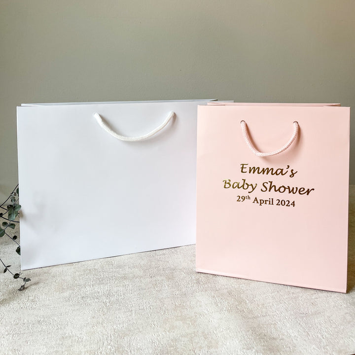 Pink and white baby shower gift bag
